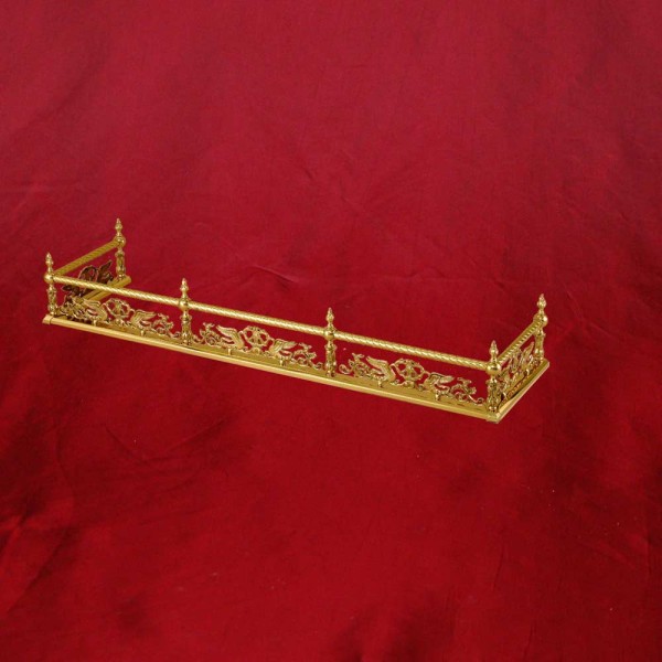 Traditional Brass Rail And Swan Fender Northshore Fireplace